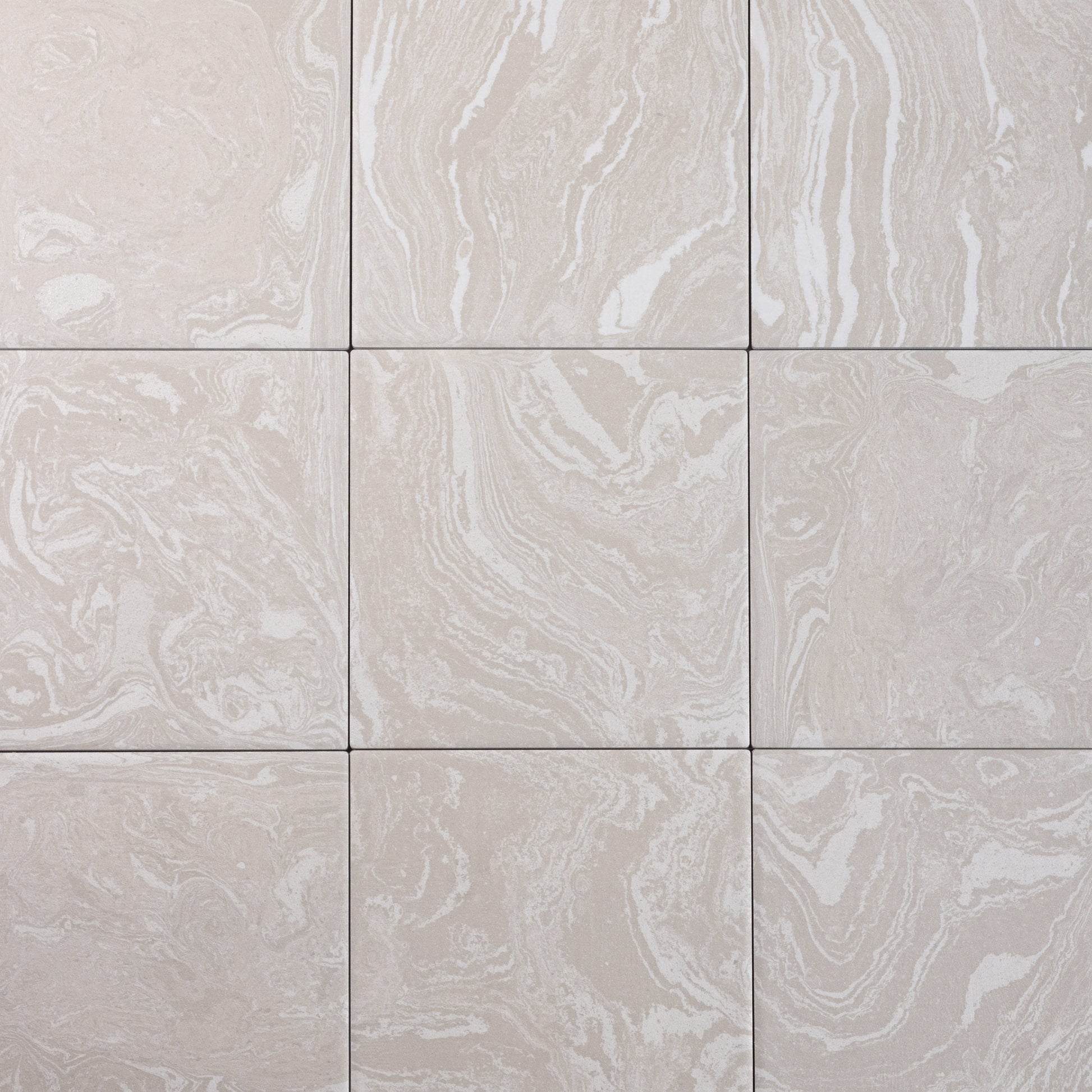 Patterned tiles with a marbled design on a light gray background porcelain