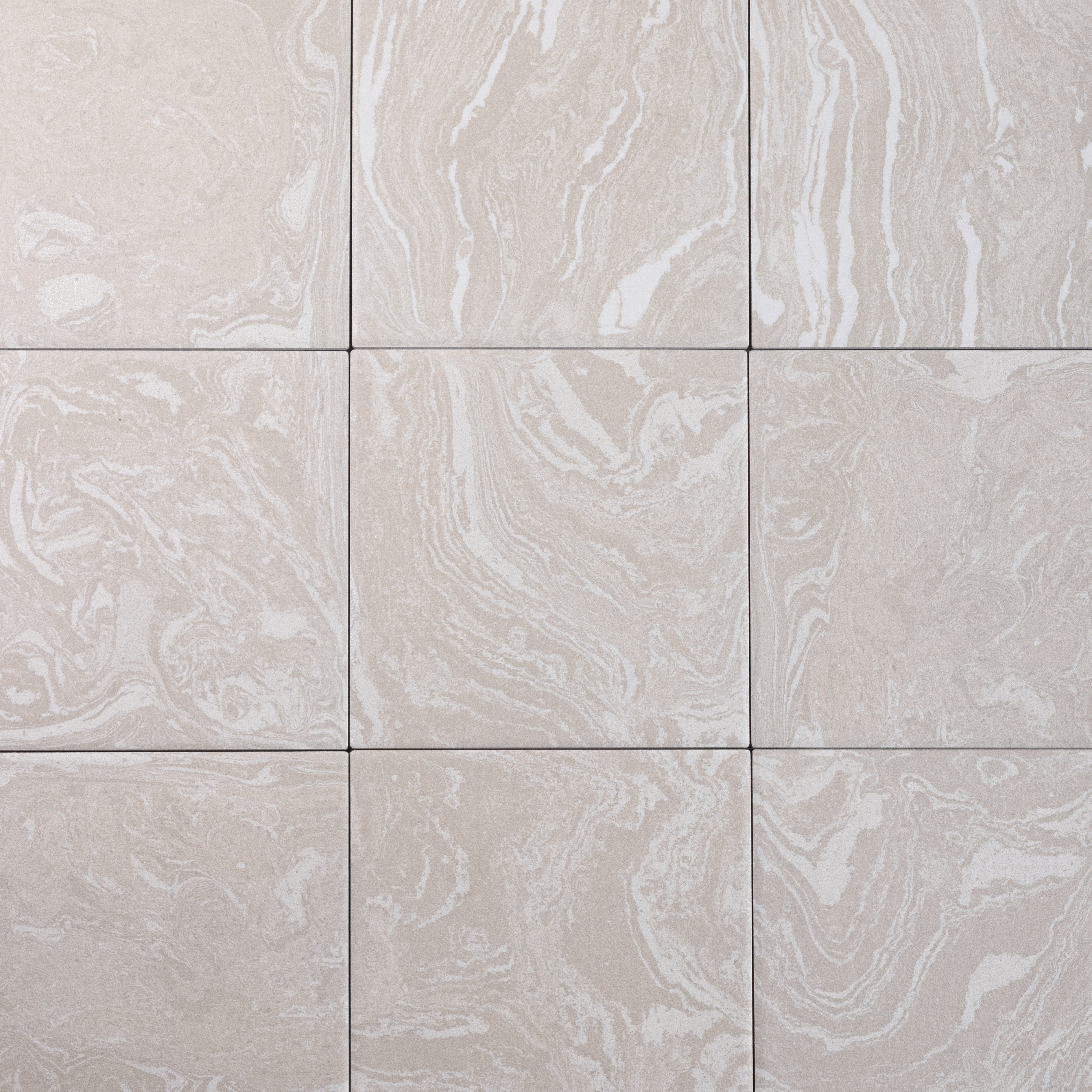 Patterned tiles with a marbled design on a light gray background porcelain