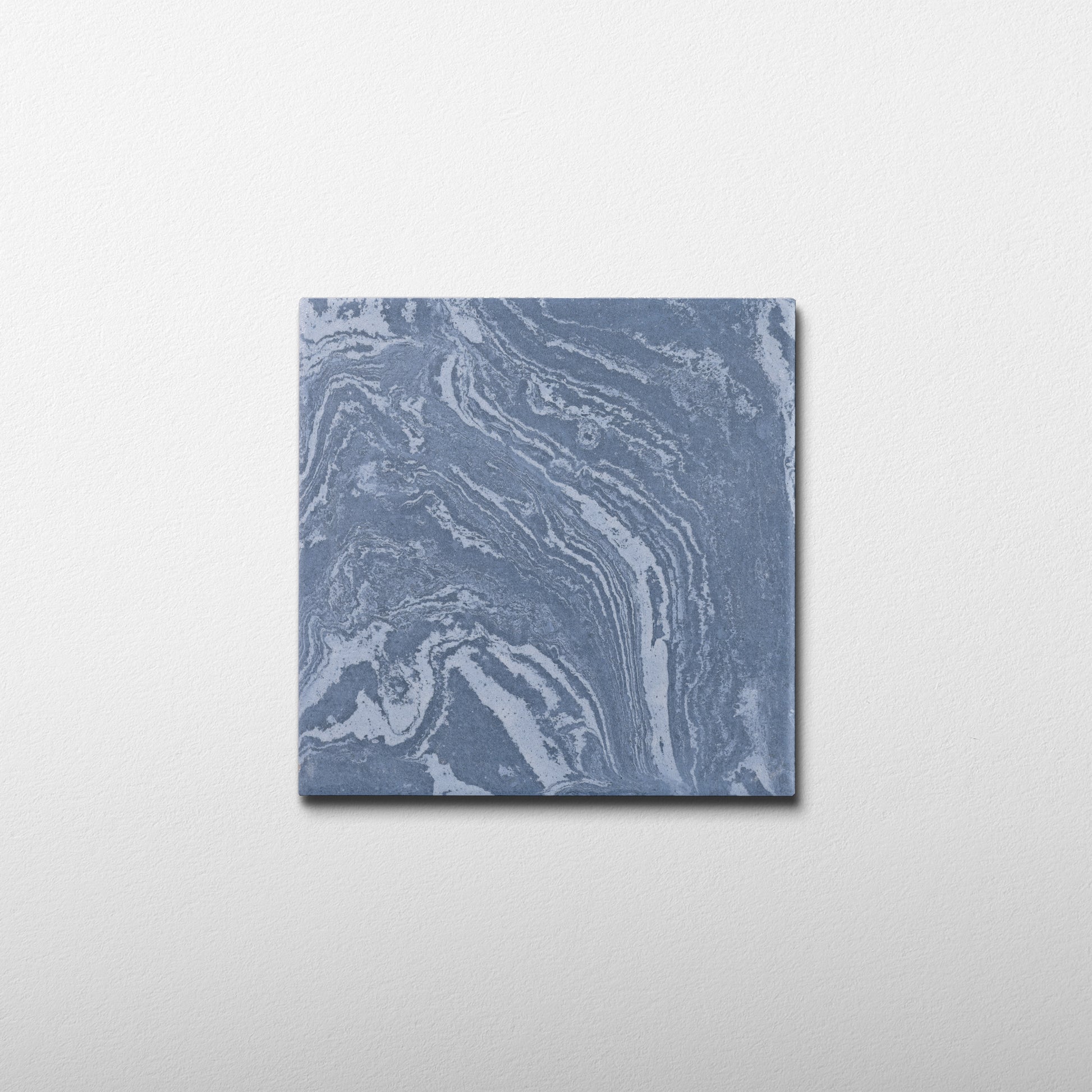 Square tile with blue and gray marbled pattern porcelain tile