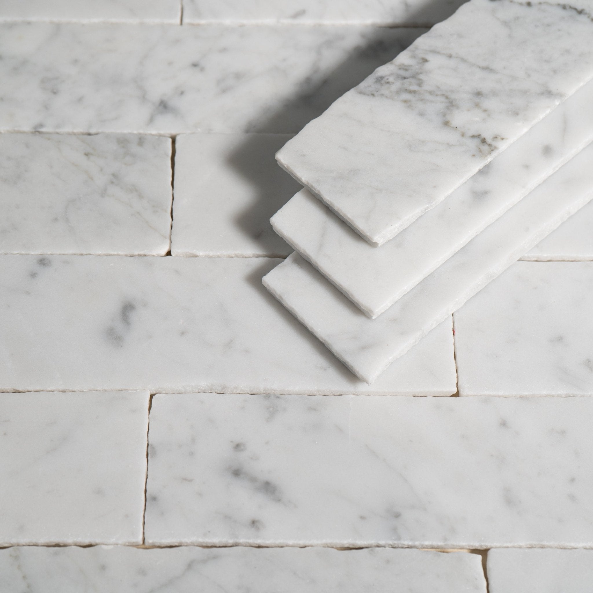 Bianco Carrara Marble 2x8 Patina Tile - Cemento Collection