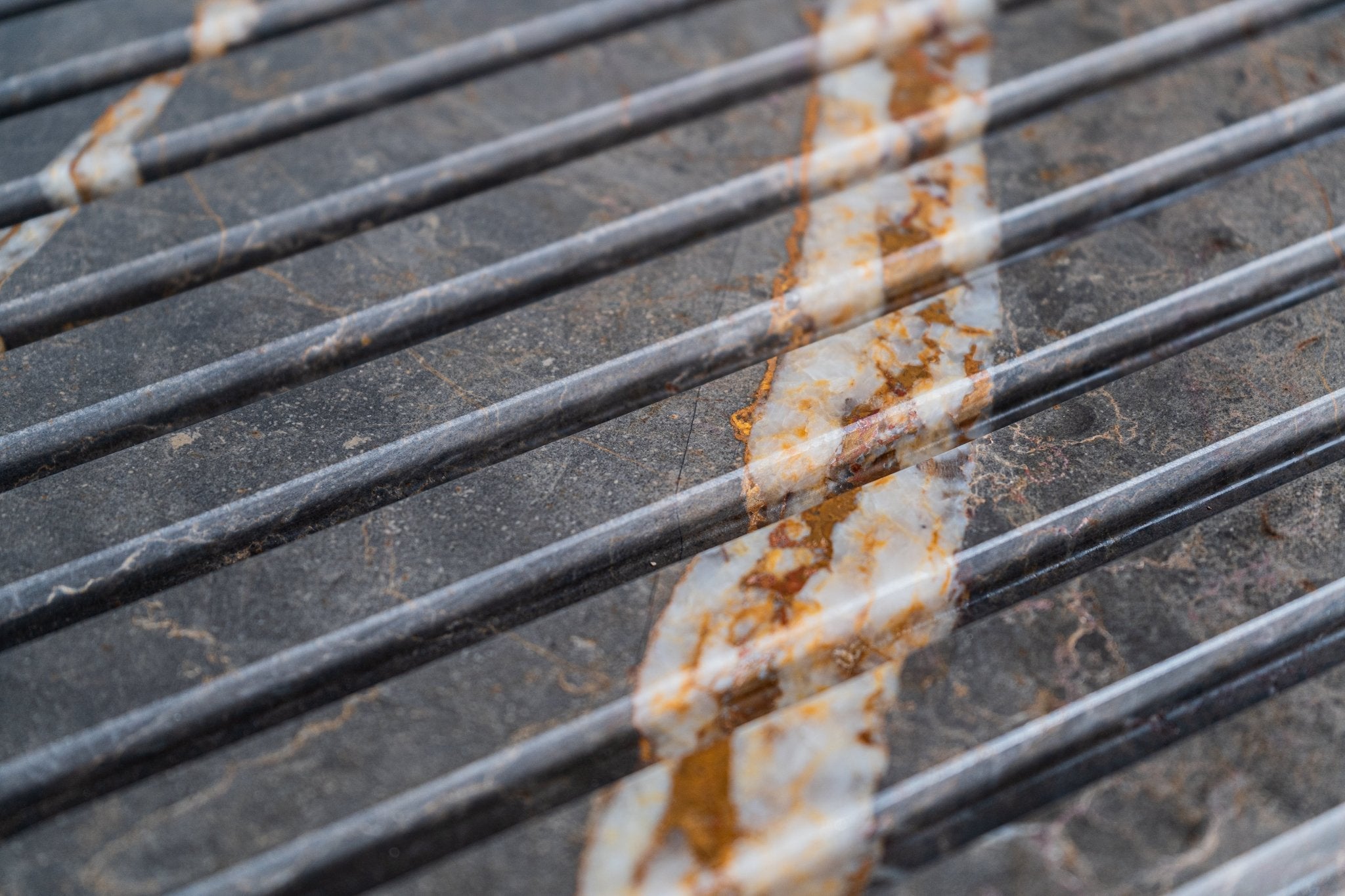 Bronze Fantasy Marble 12x24 Honed Fluted Field Tile - Cemento Collection