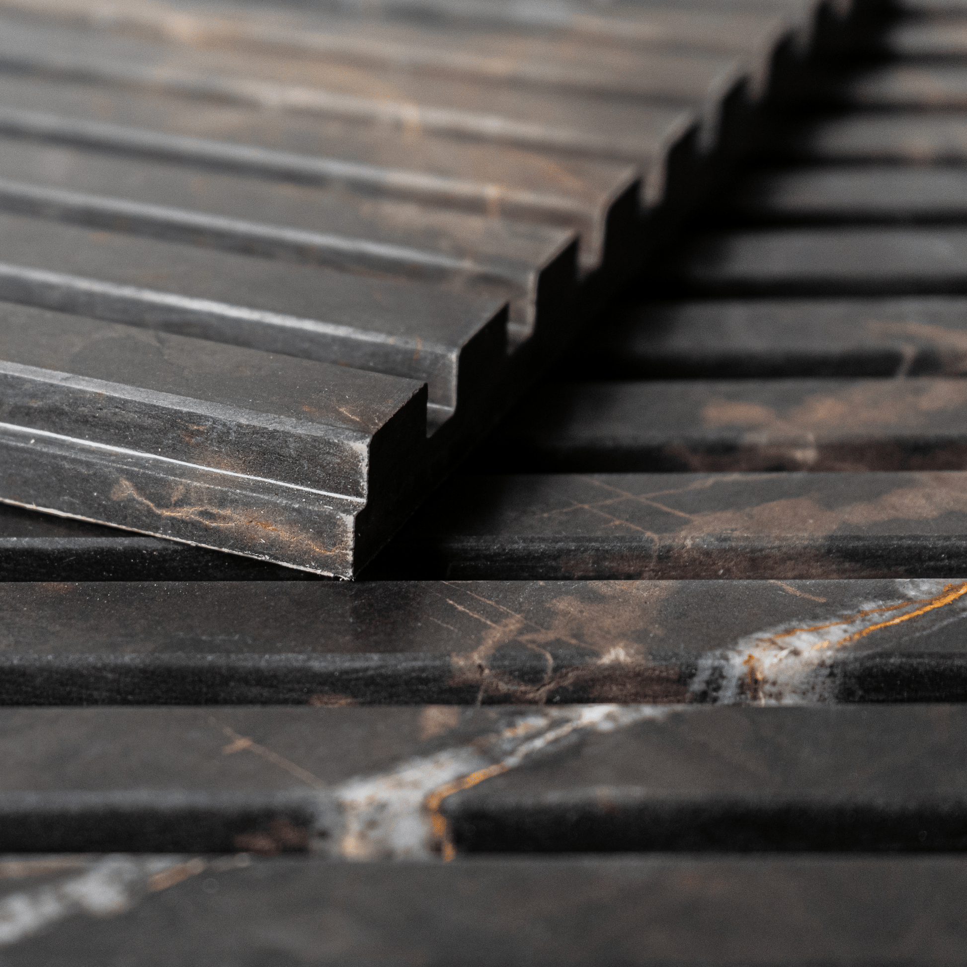 Bronze Fantasy Marble 12x24 Honed Fluted Field Tile - Cemento Collection