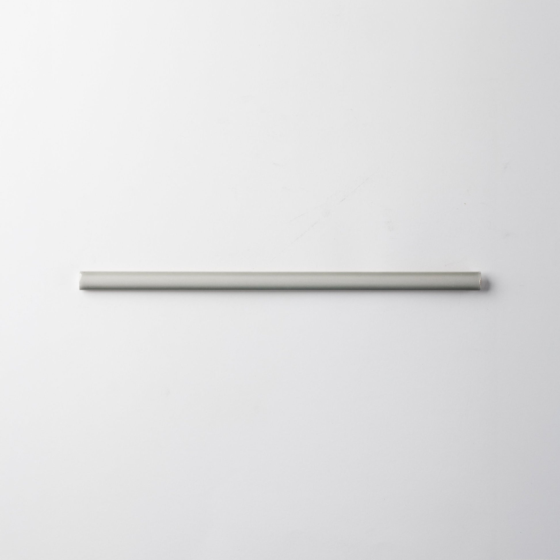 Extruded Glossy Sage Green Pencil - 1⁄2X12 - Cemento Collection
