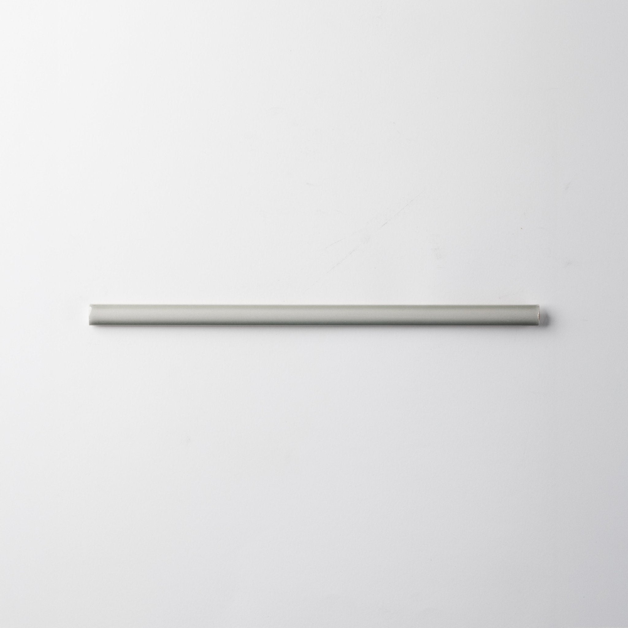 Extruded Glossy Sage Green Pencil - 1⁄2X12 - Cemento Collection