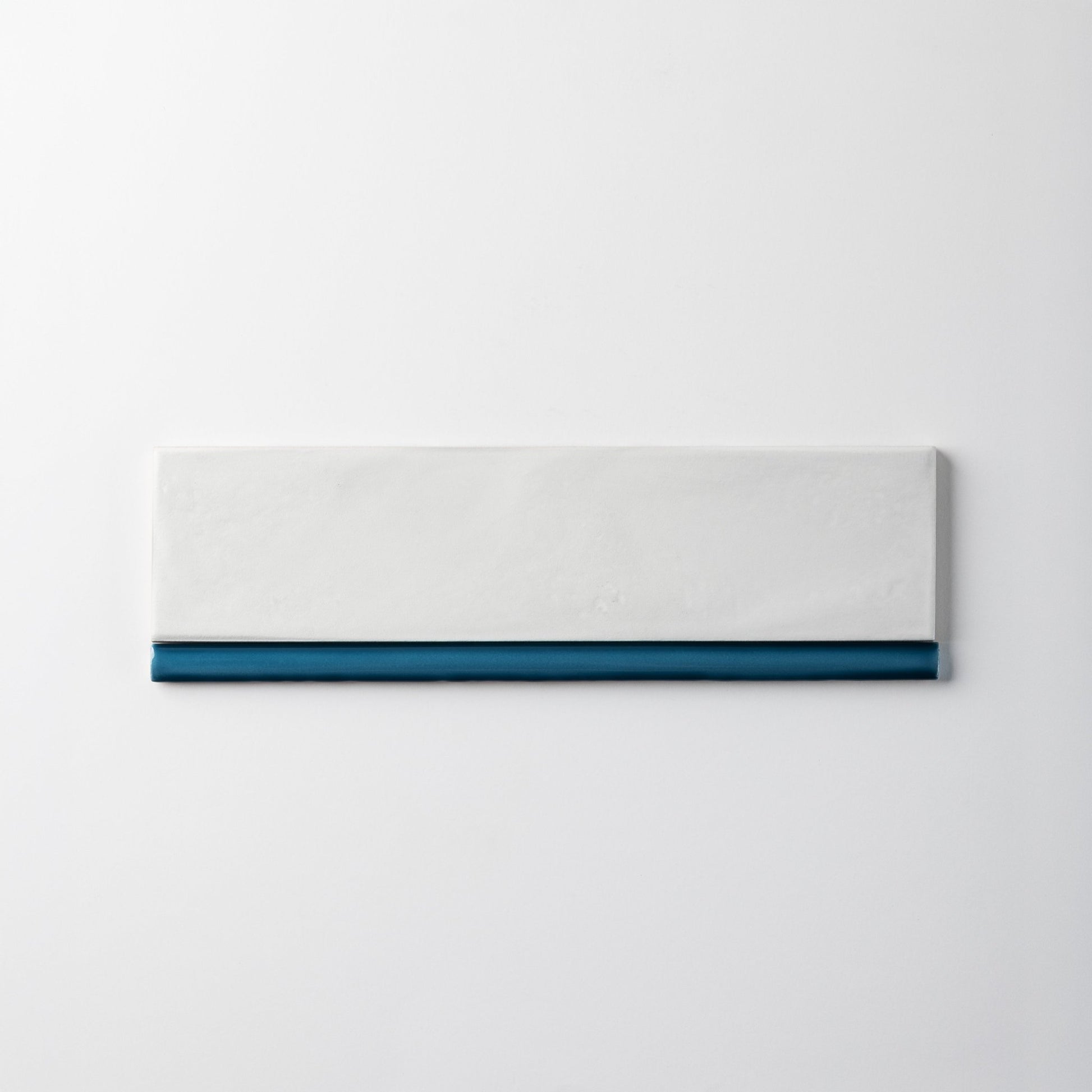 Extruded Glossy Samos Blue Pencil - 1⁄2X12 - Cemento Collection