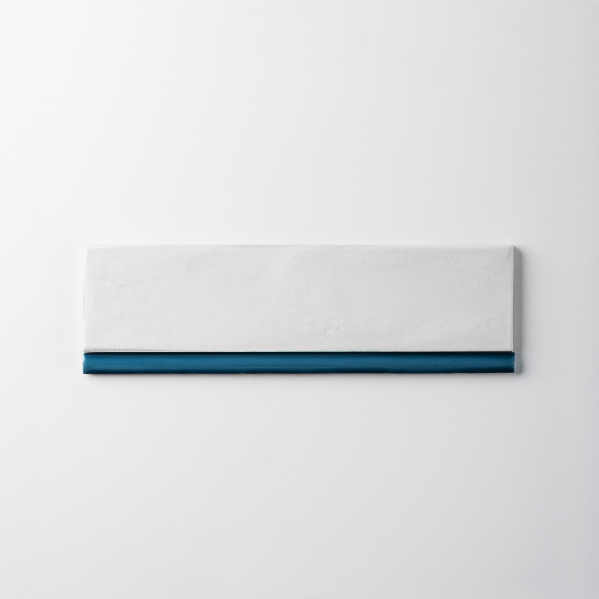 Extruded Glossy Samos Blue Pencil - 1⁄2X12 - Cemento Collection