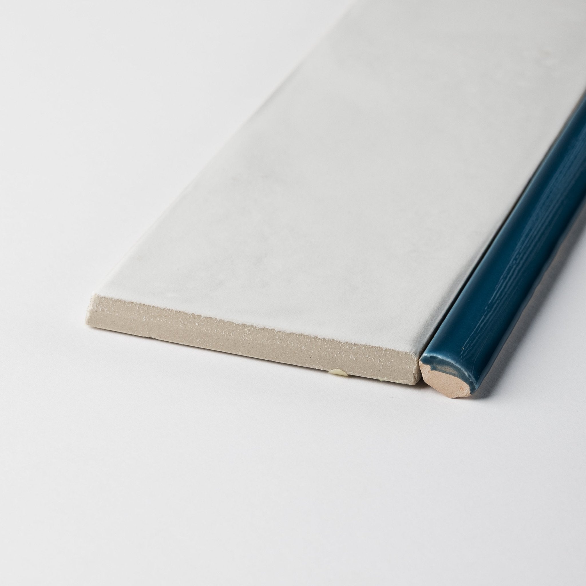 Extruded Glossy Samos Blue Pencil - 1⁄2X12 - Cemento Collection