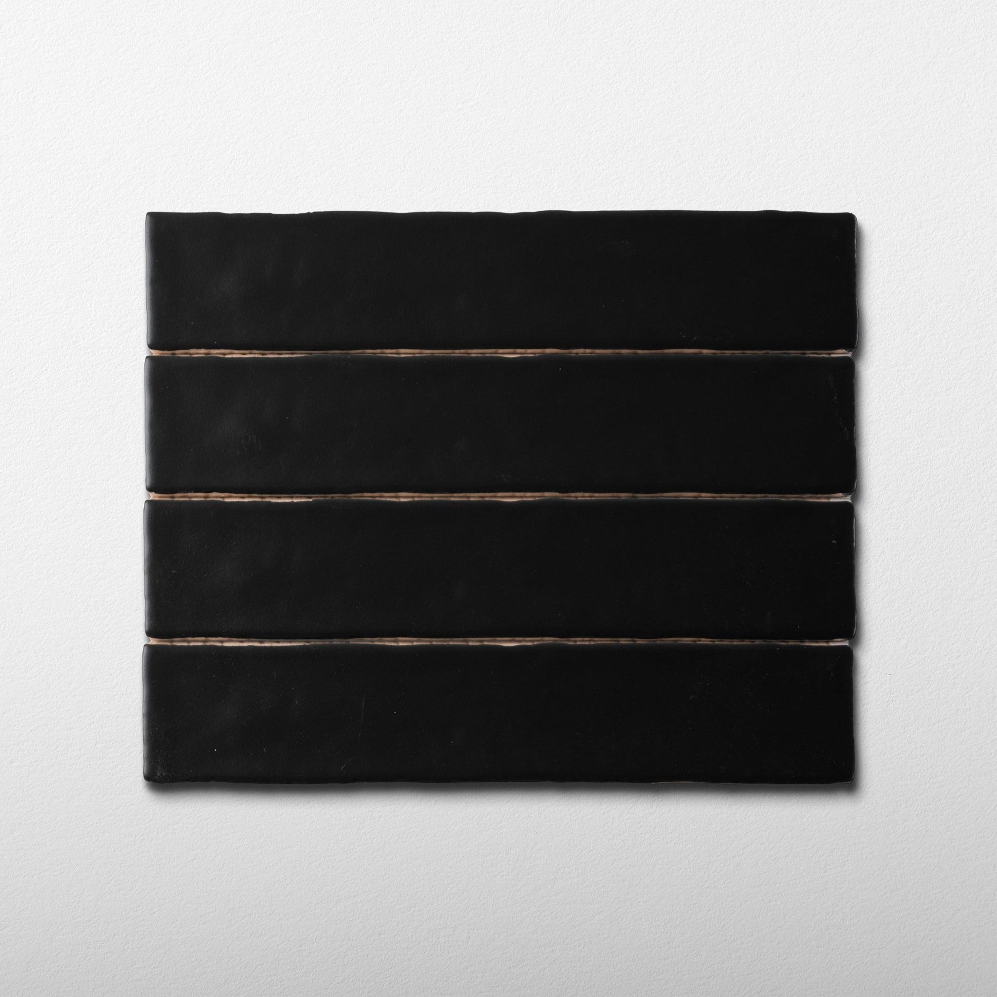 Handmade 2x10 Black Matte Undulated Subway Tile