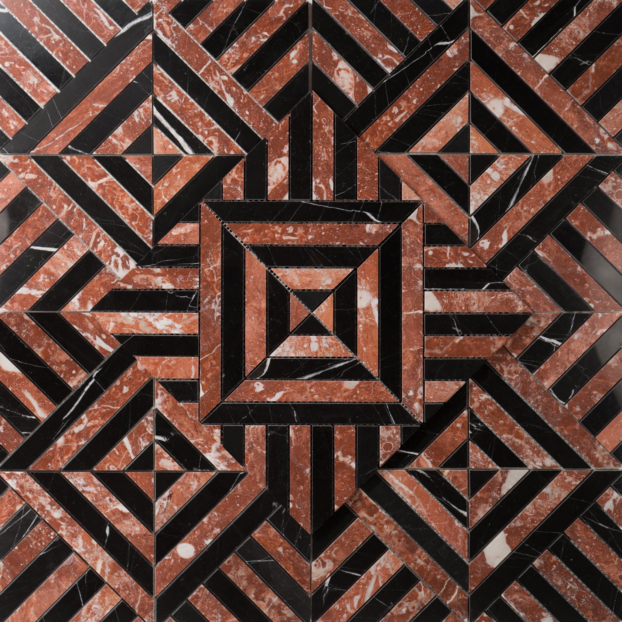 Geometric pattern of interlocking triangles in red and black