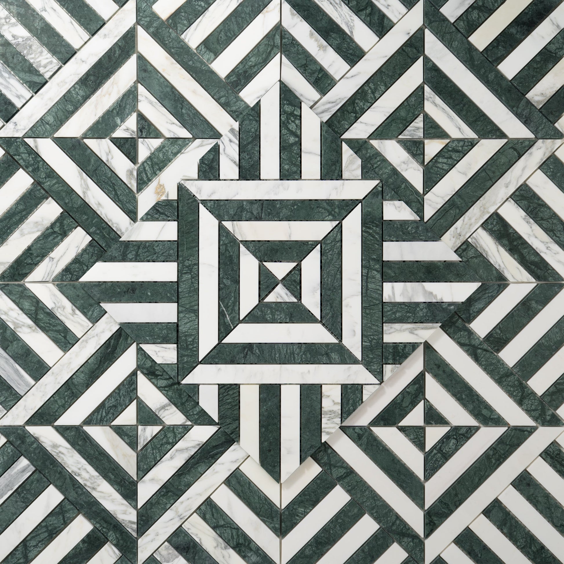 Geometric pattern of green and white tiles