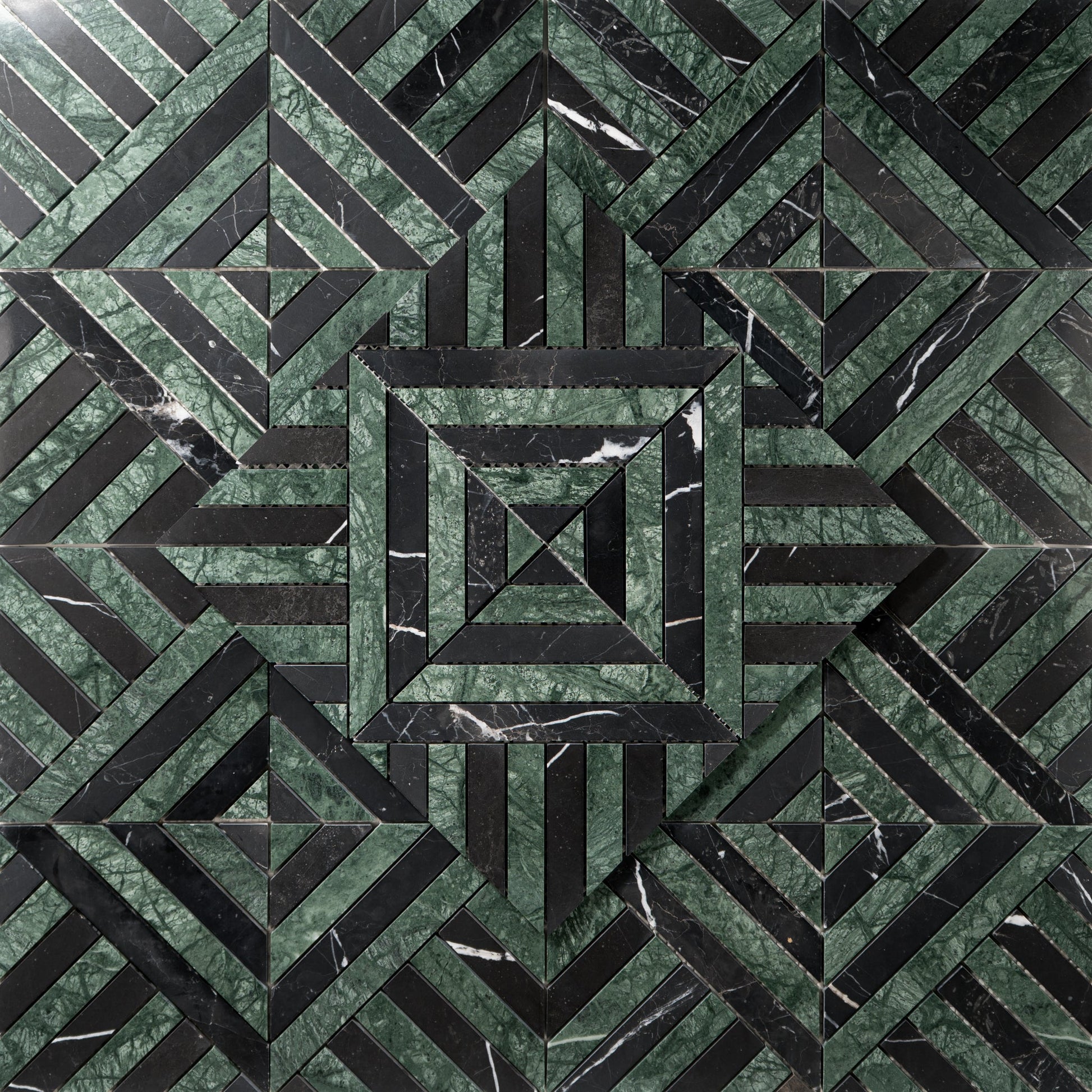 Geometric pattern of green and black tiles