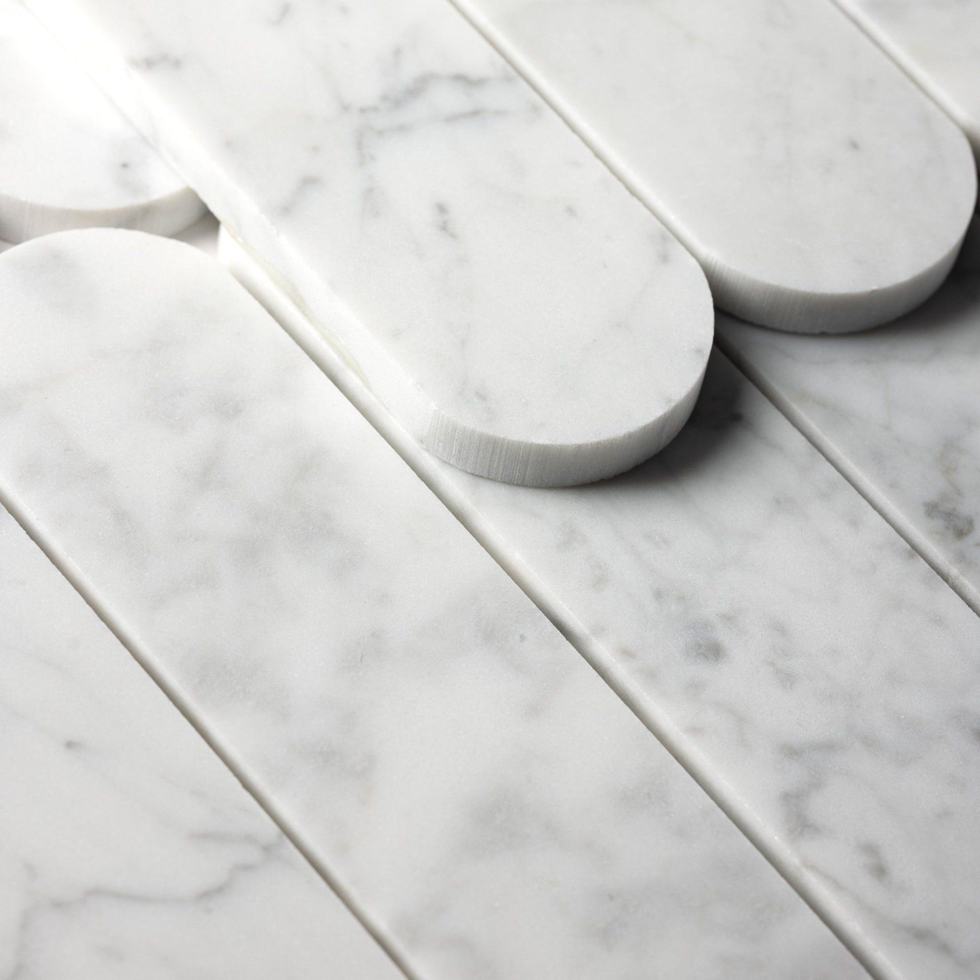 Pill Shape Bianco Carrara Marble Honed Mosaic Tile - Cemento Collection