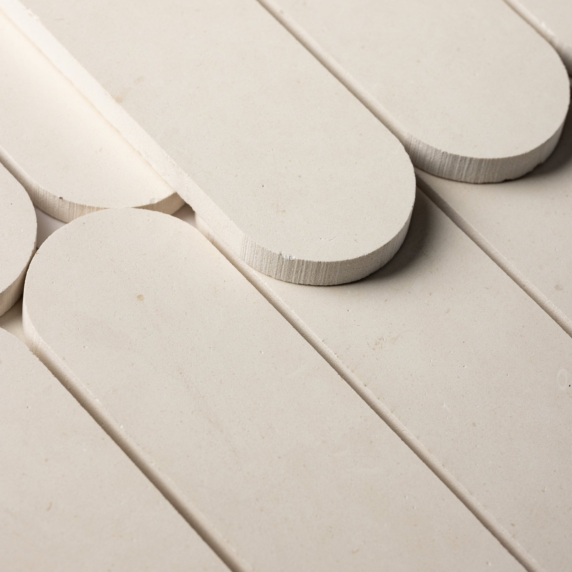 Pill Shape Limestone Honed Mosaic Tile - Cemento Collection