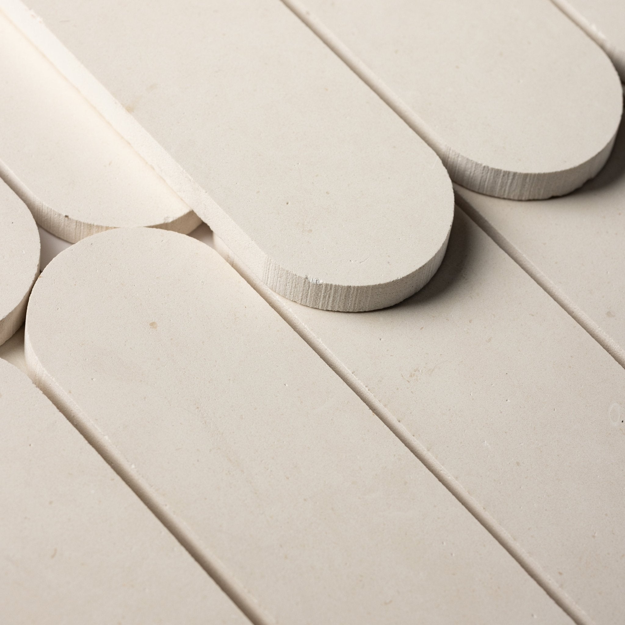 Pill Shape Limestone Honed Mosaic Tile - Cemento Collection